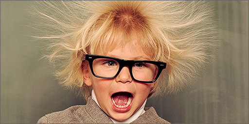 Image of young boy with hair electrified and spiky.