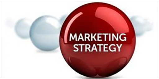 Image of balls lined up with the words 'marketing Strategy' on one centered ball.