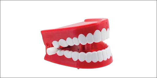 Image of chatter teeth wind up toy which represents the 'chatter' of AI bots.